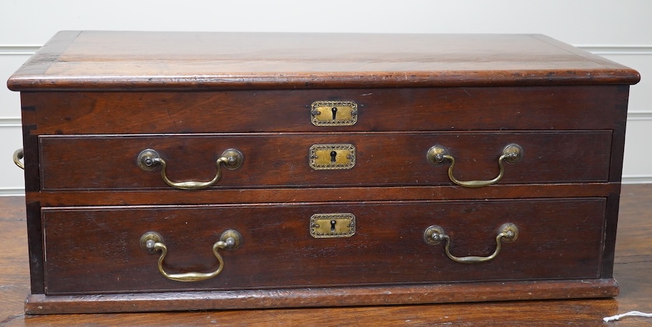 A mahogany table top three drawer stationery chest, 62cm wide, 25cm high, 29cm deep. Condition - fair